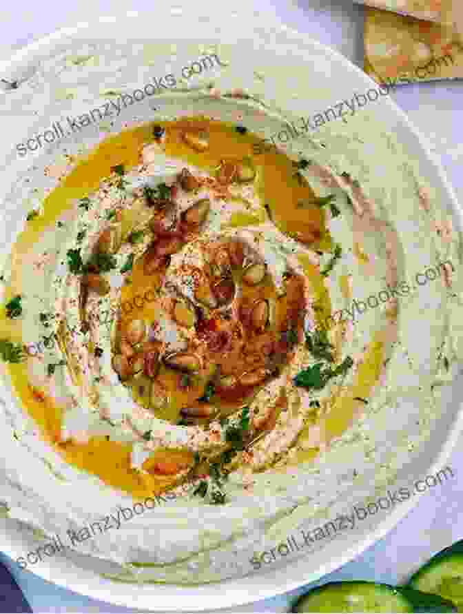 A Bowl Of Creamy Hummus With A Drizzle Of Olive Oil And A Sprinkle Of Paprika The Mediterranean Diet Cookbook: Easy Mediterranean Cuisine Recipes For Beginners Breakfast Lunch Dinner And Desserts