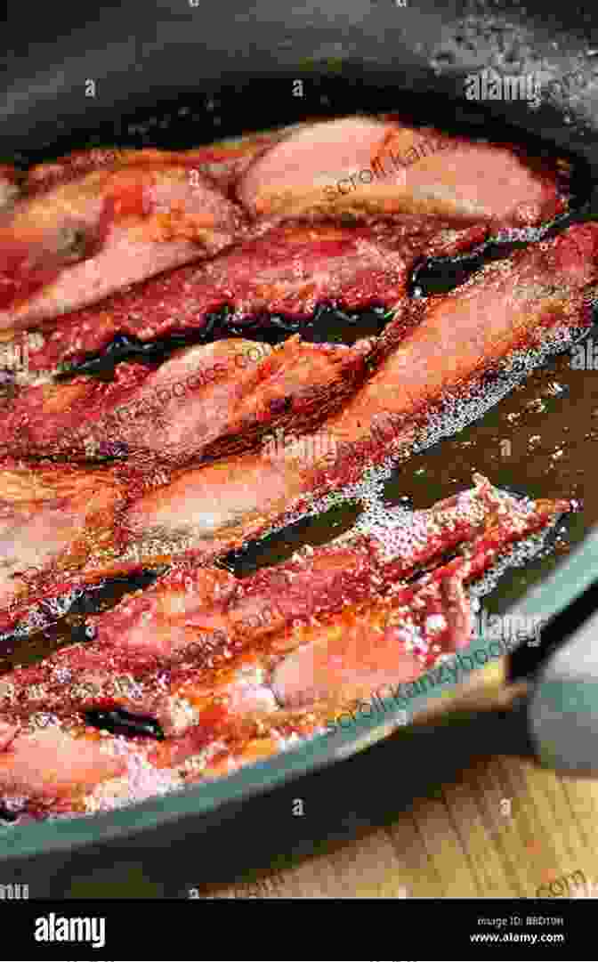 Sizzling Bacon Strips In A Frying Pan 101 More Things To Do With Bacon (101 Things To Do With)